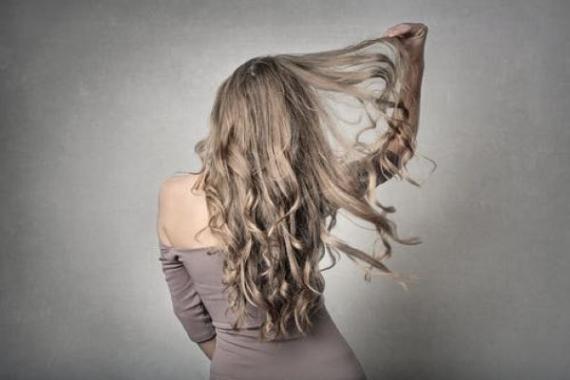 Sleek and shiny: The best anti-frizz treatments to tame flyaways this summer