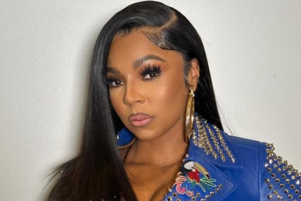 Ashanti announces arrival of first child with fiancé Nelly & shares adorable name