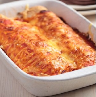 Chicken Enchiladas with a creamy pumpkin sauce