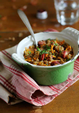 Spiced sausages stew with mixed beans and herbs