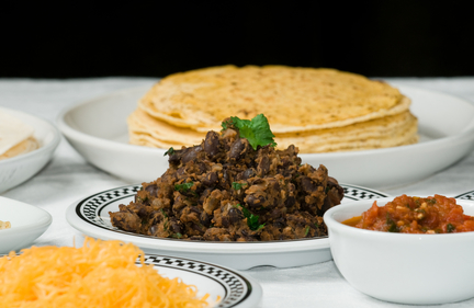 Black bean dip with fresh salsa and tortilla chips 