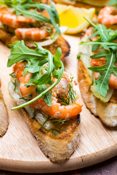 Prawn bruschetta with a fennel and lemon salad