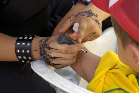 Charity warns parents over the risk of temporary henna tattoos