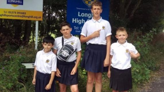 These young lads protested against their school by wearing skirts! 