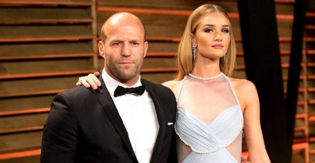 Rosie Huntington-Whiteley debuts her baby bump at the launch of her new cosmetics line