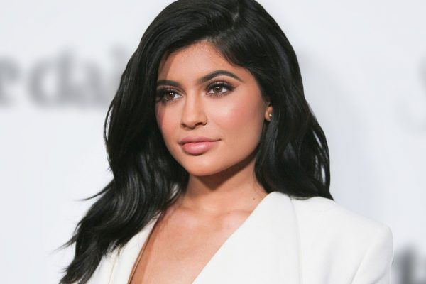Kylie Jenner cradles baby bump in never-before-seen pregnancy photo