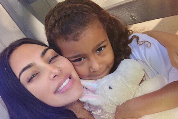 Kim Kardashian is under fire after 6-year-old North West wears hoop earrings