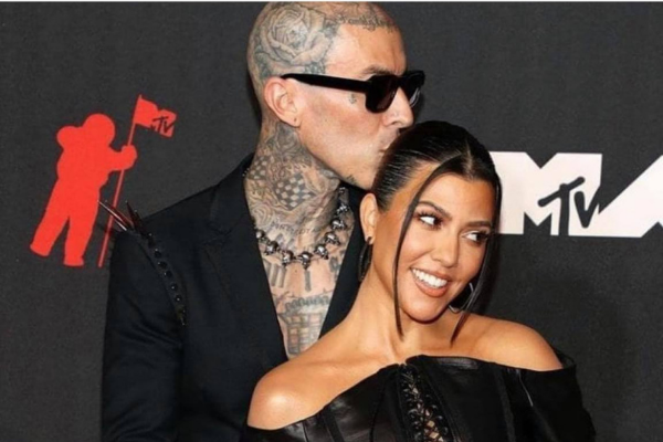 Travis Barker reveals rare glimpse of baby son on holiday with Kourtney Kardashian