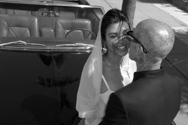 Kourtney Kardashian shares first official photos from her & Travis’ intimate wedding